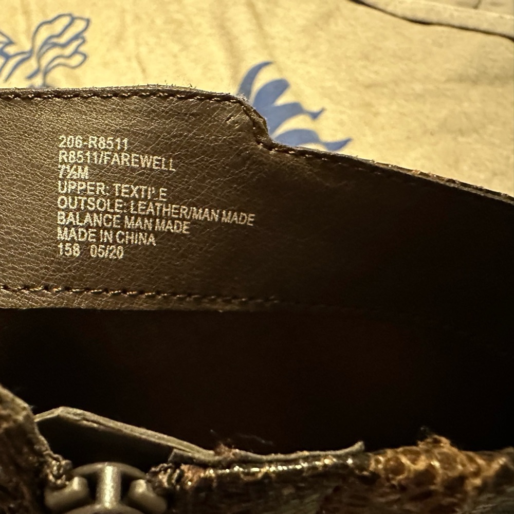 Snake skin heel boots.